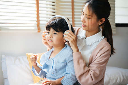 Private duty nurse explain the result of observation for her old patient in the backyard of his house.の写真素材