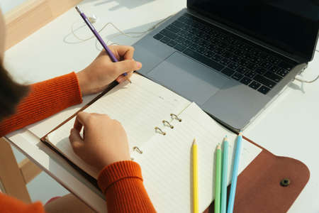 Asian student study or learn from home during covid-19 epidemic.の写真素材