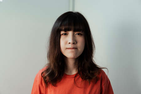 A front of Thai girl who need the hand of someone to bring bring her to life.の写真素材