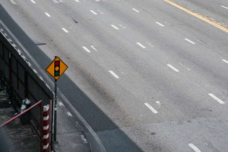 Highway empty road in Bangkok city with traffic sign.