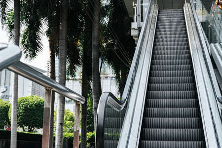 Empty escalator with no people using it. Bangkok city area.の写真素材