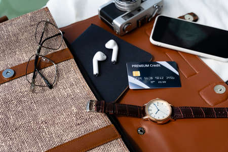 Office modern desk mock up template with smart phone, credit card, watch, eyeglasses, camera. View...