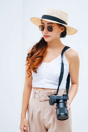 Young traveler asian woman with digital camera.の写真素材