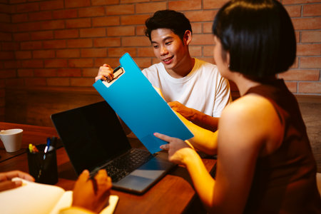Young people doing startup together in modern meeting room.の写真素材