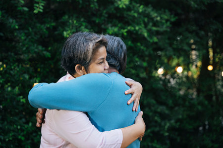 Romance asian senior couple hugging and embracing each other outdoors.の写真素材