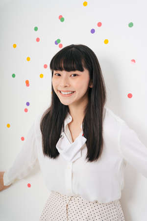 Cheerful beautiful asian thai long dark hair woman isolate over white background. Joyful and happy.