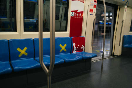 Social distancing. Empty seat in Metro train. Covid-19 outbreak.