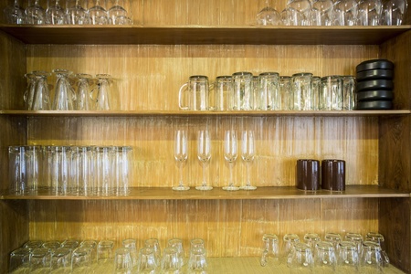 Glasses in Wood Shelfの写真素材