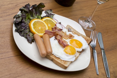Breakfast with bacon, fried eggの写真素材