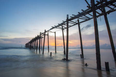 Wood bridge at sunsetの写真素材