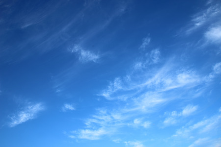 Blue sky and white clouds backgroundの写真素材