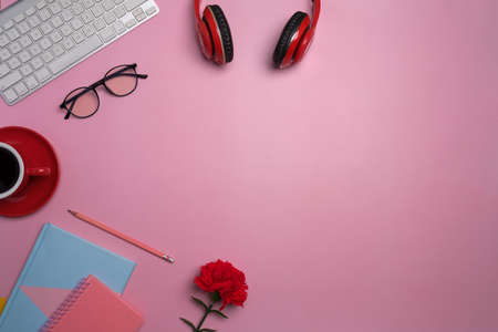Mock up with working space concept, red headset, red flower, red glass coffee, key board, notebook...