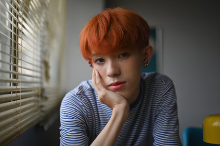 Portrait with Asian gay teenage, LGBT boy looking at the camera with attractive expressions.