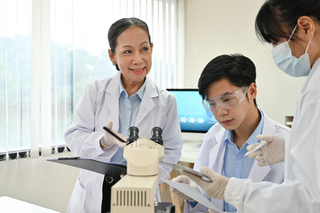 Researchers experimenting in the lab. Scientific experiment..