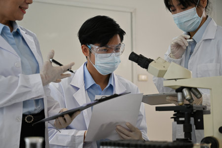 Researchers experimenting in the lab. Scientific experiment..