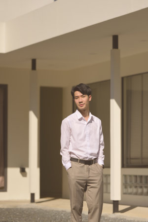 Portrait image of a Smart and Looking Good of Young Asian Businessman.の写真素材
