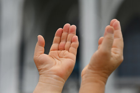 Close-up image of woman hands praising with Allah.の写真素材