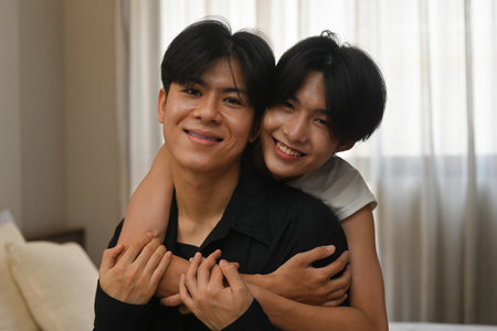 Happy gay couple embraced, Concept of LGBT pride month and LGBT couple.の写真素材