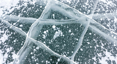 Ice hummocks on the frozen lake. Winter landscape. Top view.