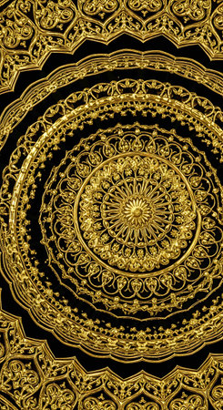 golden pattern on a black background, closeup of photo.の写真素材