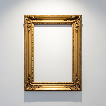 blank golden picture frame on the wall (clipping path included)の写真素材