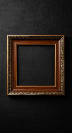 Photo or painting frame on black wall. Mockup for design.の写真素材