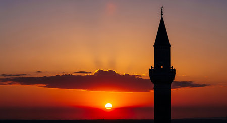 Sunset over the minaret of the mosque in Istanbul, Turkeyの写真素材