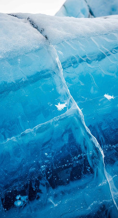 Ice on Lake Baikal, the deepest and largest freshwater lake by volume in the world, located in...