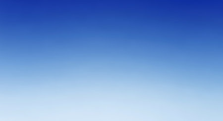 Blue sky background. Abstract blue sky background. Blue sky background with tiny cloudsの写真素材