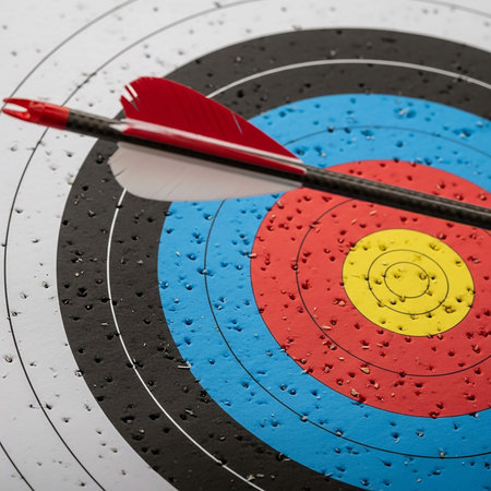 Archery target with red arrow on the center, business success conceptの写真素材