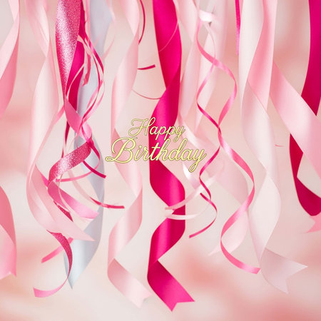 Happy birthday greeting card with pink and white ribbons on soft backgroundの写真素材