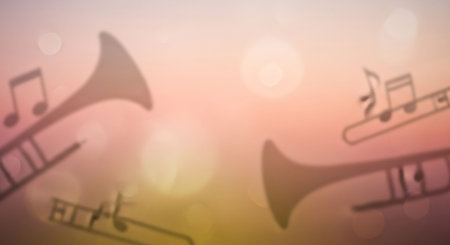 Blurred image of trumpet and trumpet on sunset background with bokehの写真素材