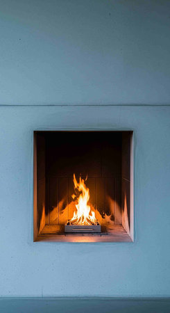 Fire in the window of the house, beautiful photo digital picture.の写真素材