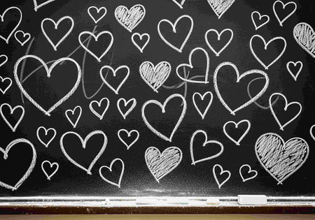 Chalk drawn hearts on a blackboard. Valentines day backgroundの写真素材