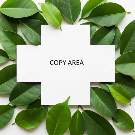 Top view of white paper card with copy space on green leaves background