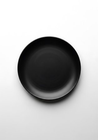 Black plate isolated on white background. 3d illustration. Top view.