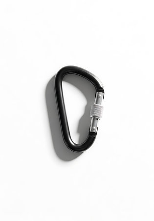 Black carabiner isolated on white background. 3D rendering.の写真素材