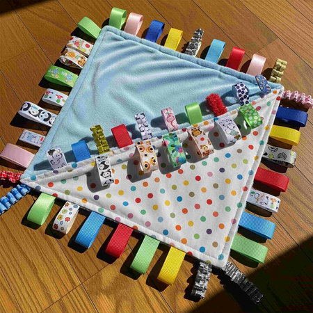 Cloth on a wooden floor in a children's room with toys
