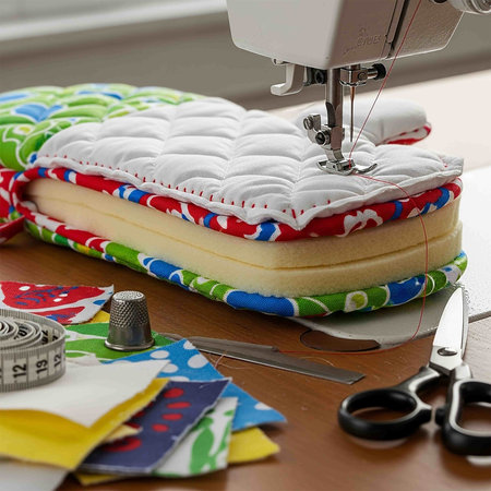 Sewing machine and fabric on the table. Sewing concept