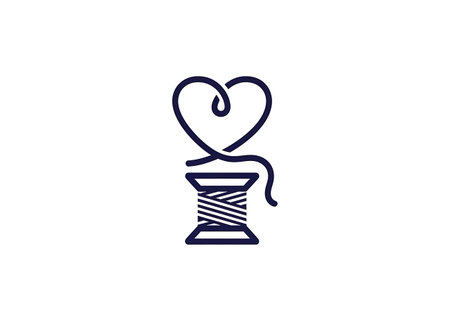 Spool of thread with heart icon logo vector illustration design template.の写真素材