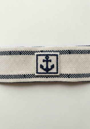 Close up of a sailor belt on a white background with copy space