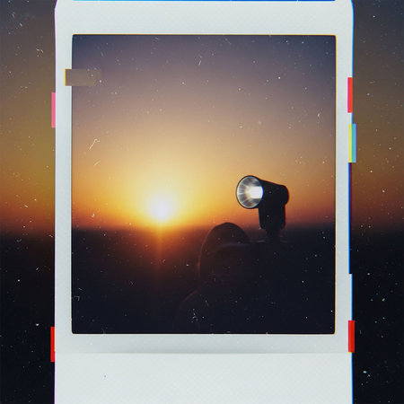 Photograph with lens flare in the background of the sunset and the skyの写真素材