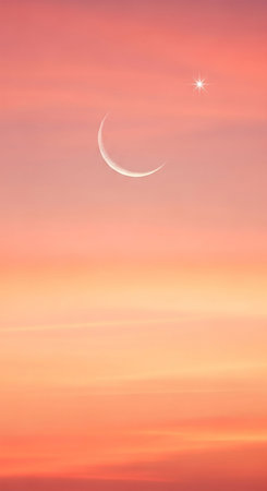 Crescent moon and stars at sunset time.の写真素材
