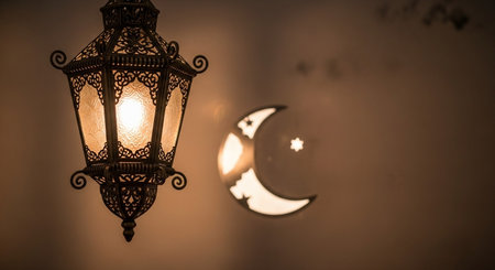 Hanging lamp on the background of the crescent and the moonの写真素材