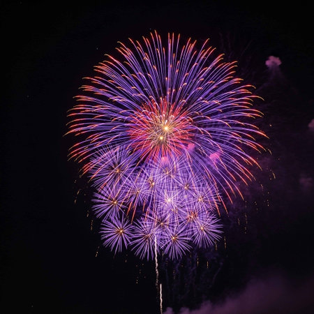 Colorful fireworks of various colors over night sky, celebration and anniversary conceptの写真素材