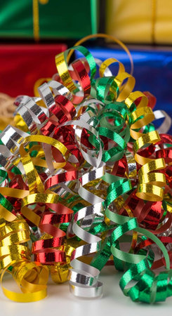 Colorful streamers and gift boxes for Christmas and New Year celebrationの写真素材