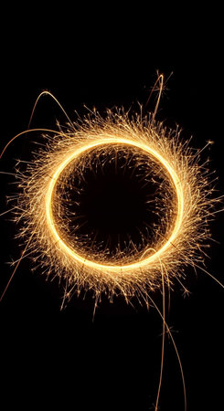 sparkler circle on black background with space for text or image