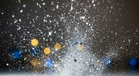 abstract background with bokeh defocused lightsの写真素材