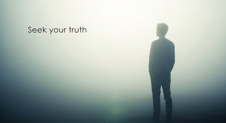 Silhouette of a man standing in the fog and looking at the text
