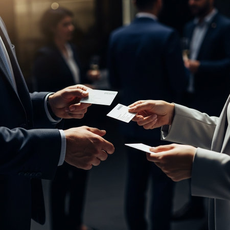 Cropped image of business people exchanging cards during meeting in officeの写真素材